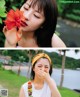 A woman holding a red flower in front of her face.