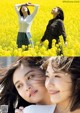 A couple of women standing in a field of yellow flowers.